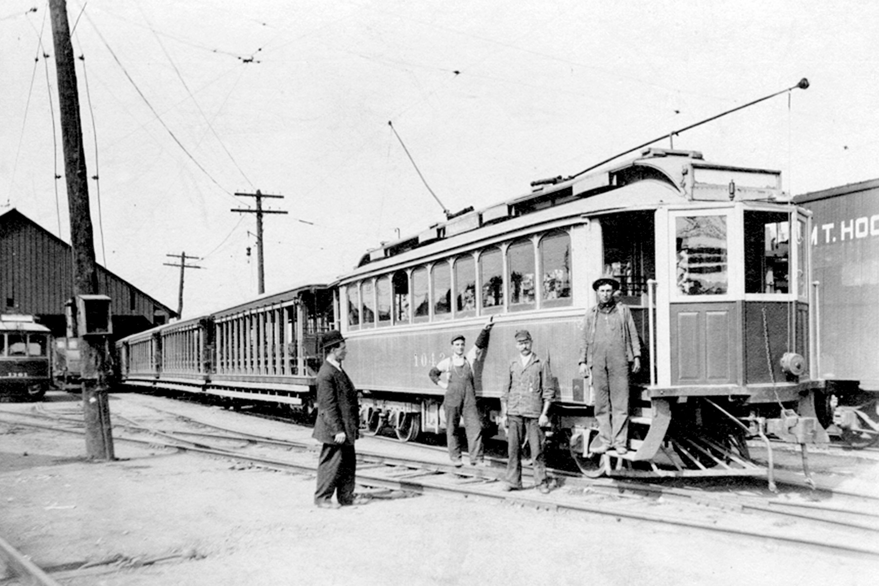 Circa 1910. Before the Type 2 MAX cars, stairs had always been the only way to get on to a rail car